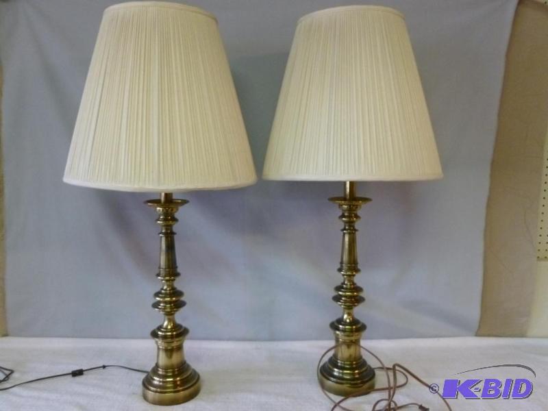 lot 65 image: Lot of two brass end table lamps that measure...