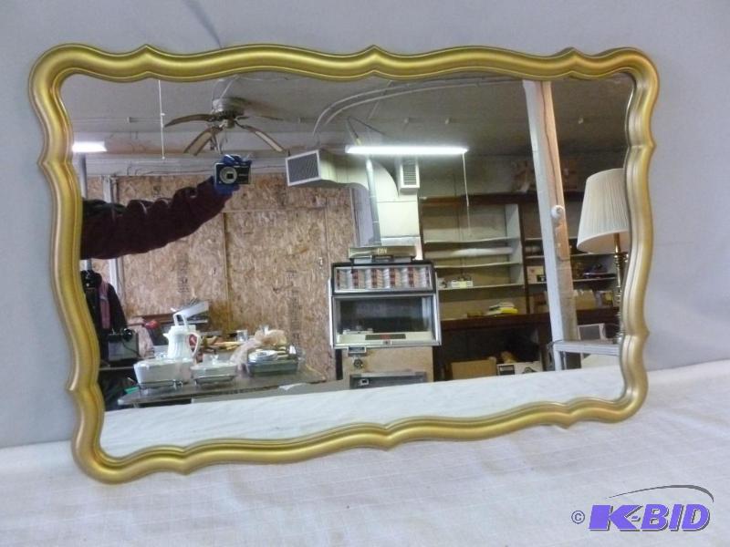 lot 67 image: Nice framed hall mirror that measures 24"...