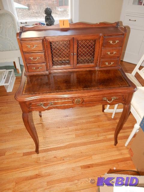 Beautiful writing desk.. Solid Walnut with Leather writing surface.. Gold stenciled design.