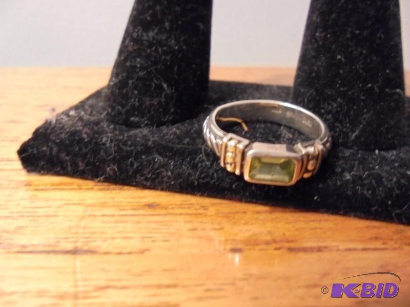 lot 1 image: Sterling Silver ring with 18 Karat Gold accen...