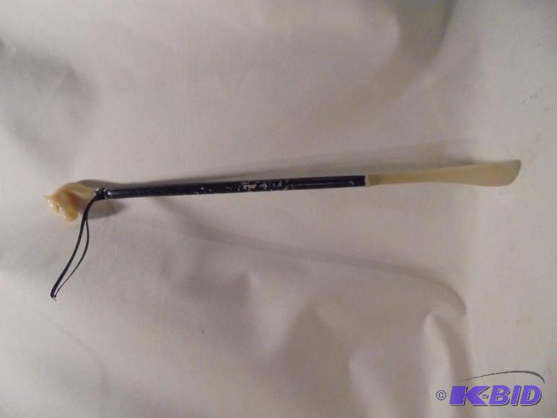 lot 105 image: Vintage Resin and wood Horse Head shoe horn. ...