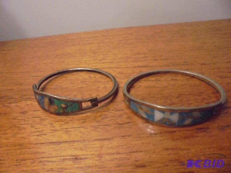 lot 15 image: Pair of Taxco Sterling Silver bracelets with ...