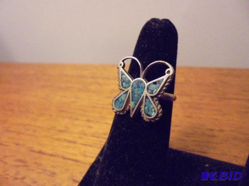 lot 21 image: Sterling and turquoise butterfly ring....
