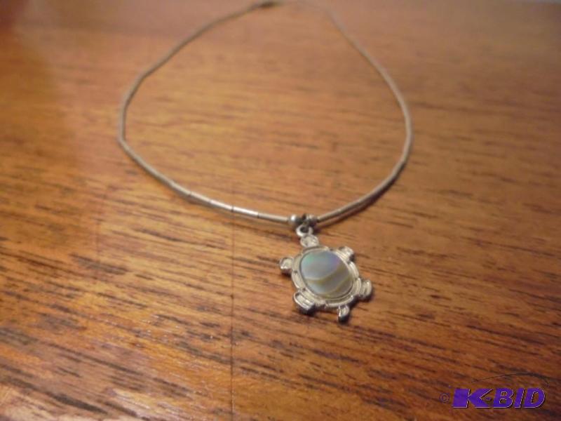 lot 31 image: Sterling and Mother of Pearl turtle pendant n...