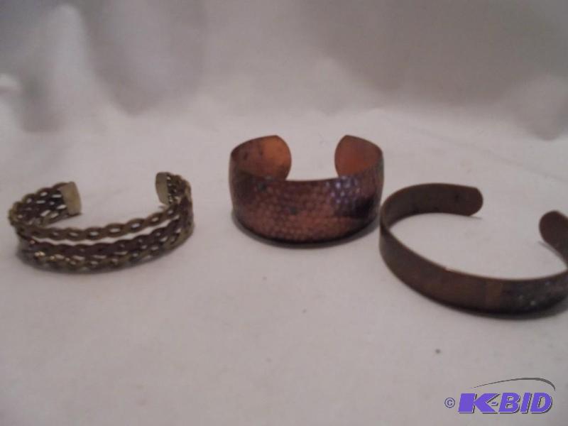 lot 38 image: Lot of (3) vintage Copper bracelets.  ...