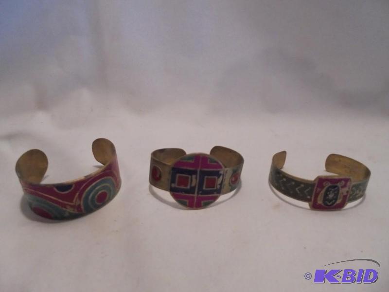 lot 48 image: Lot of (3) vintage enamel over Brass cuff bra...