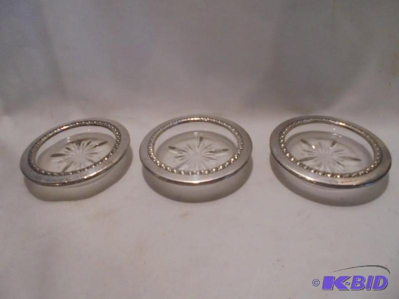 lot 61 image: Lot of (3) Sterling Silver and glass coasters...