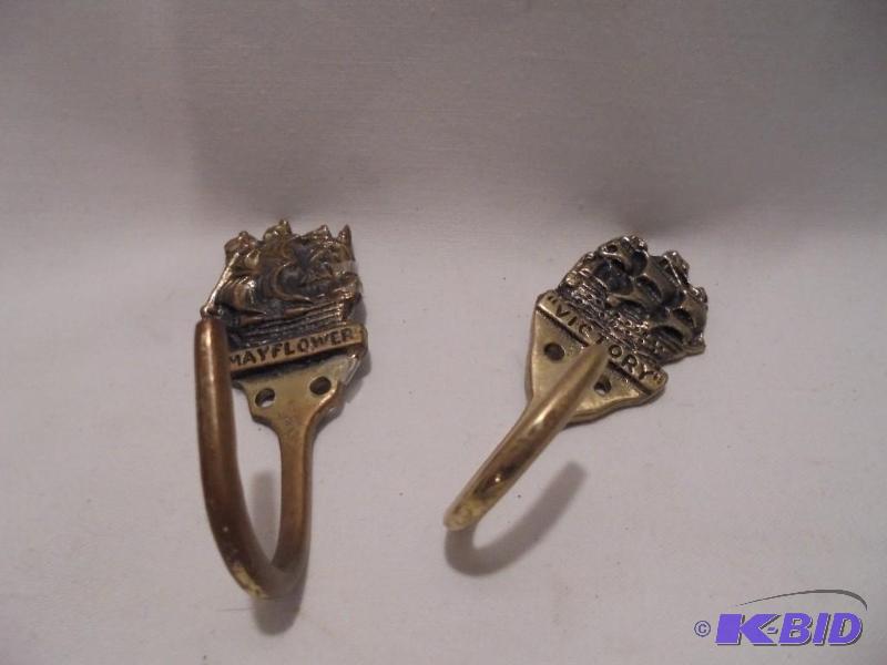 lot 67 image: Lot of (2) vintage wall hooks.  ...