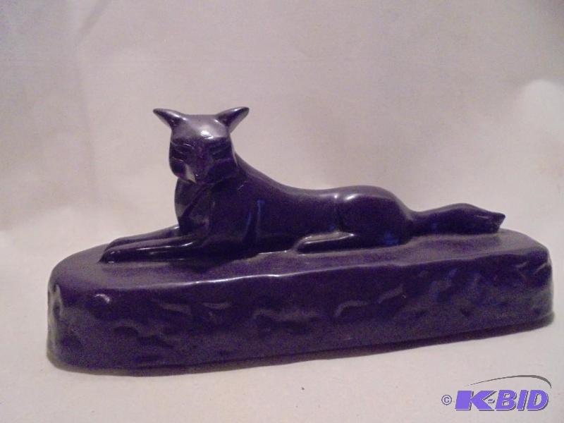 lot 76 image: Heavy 9 inch painted unknown material sphinx....