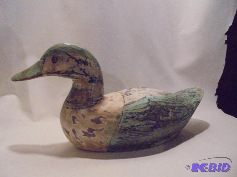 lot 97 image: Antique hand carved wooden duck decoy.  ...