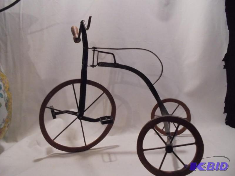 lot 99 image: 15 inch metal on wood decorative tricycle. &n...