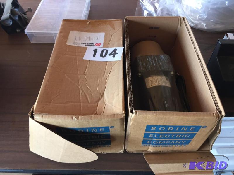 lot 104 image: 2 new Bodine motors....