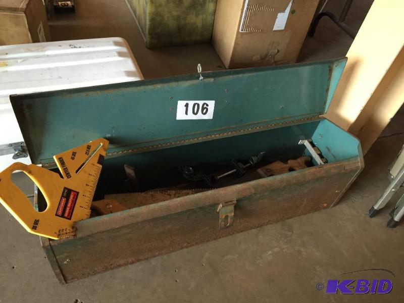 lot 106 image: Metal tool box with tools including hand saws...