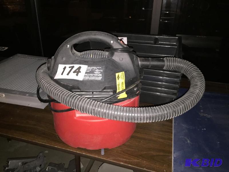 lot 174 image: Hand held shop vac....