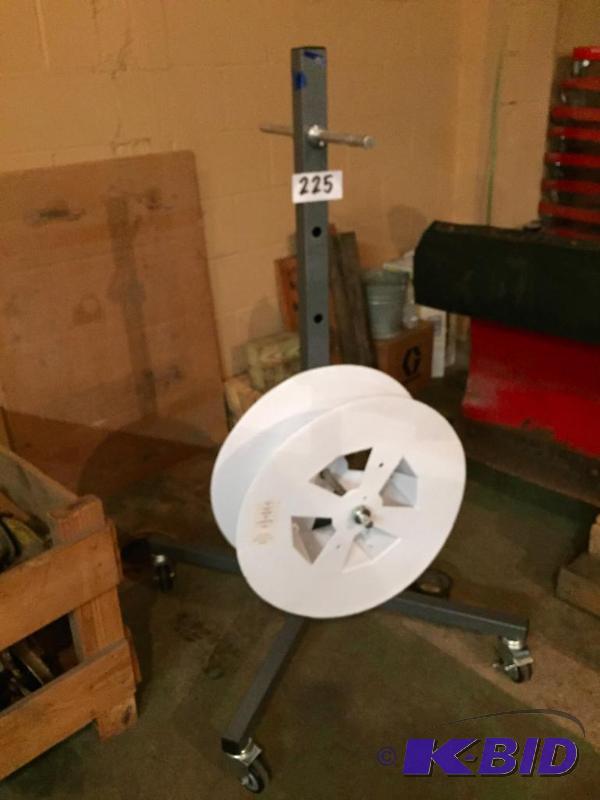 lot 225 image: Metal reel stand on casters....