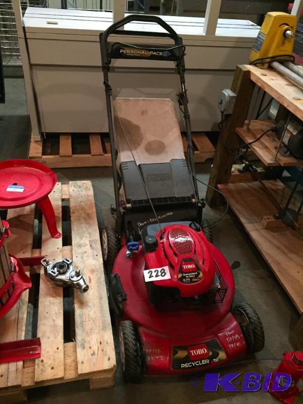 lot 228 image: Toro recycler lawn mower. Motor has compressi...