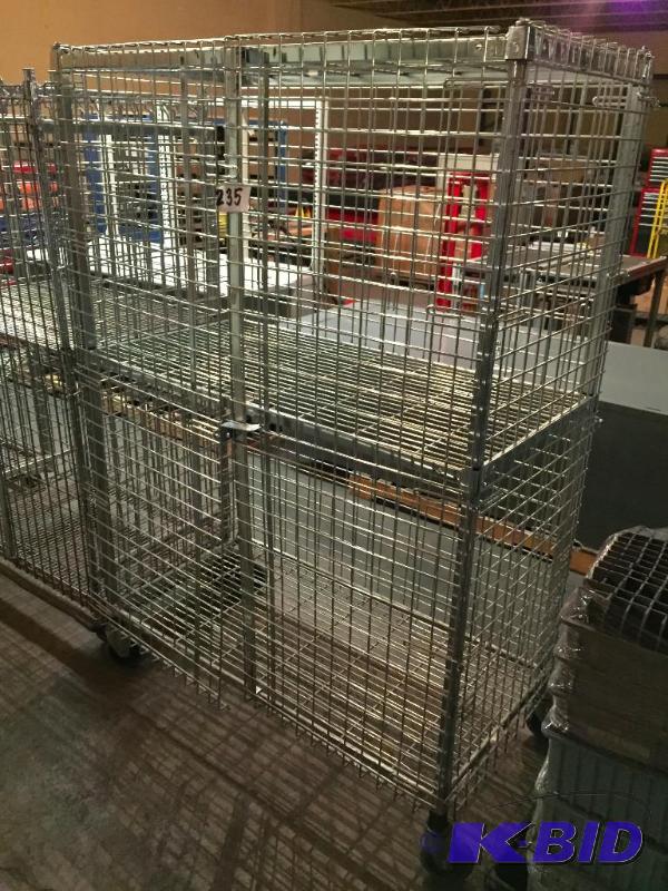 lot 235 image: Metal wire storage cage on casters....