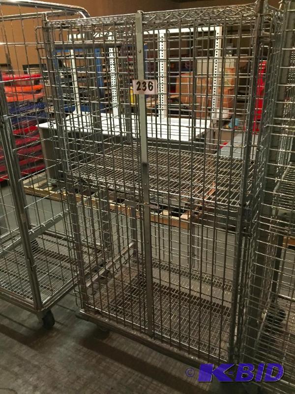 lot 236 image: Metal wire storage cage on casters....