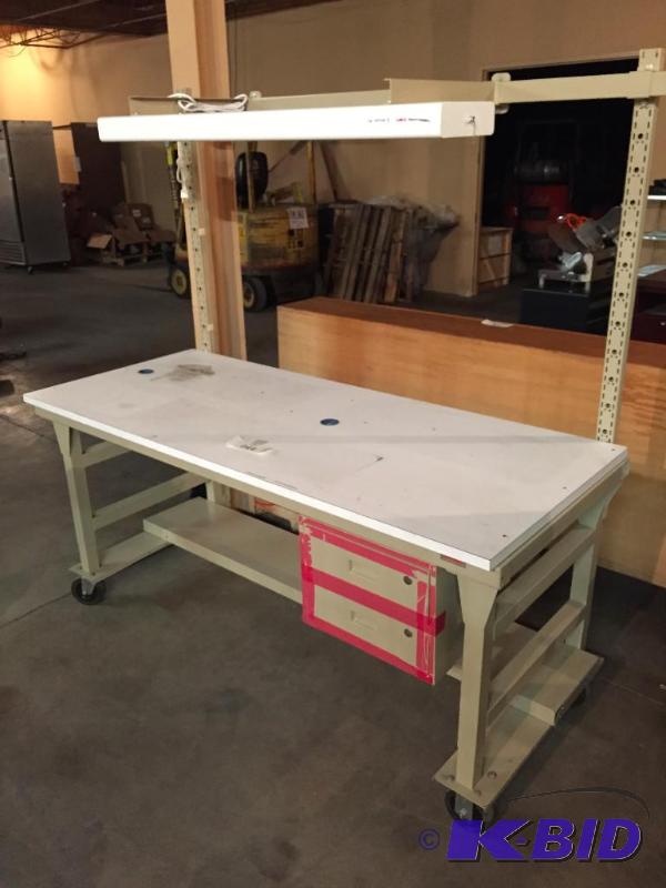 lot 242 image: Work bench  station on casters....