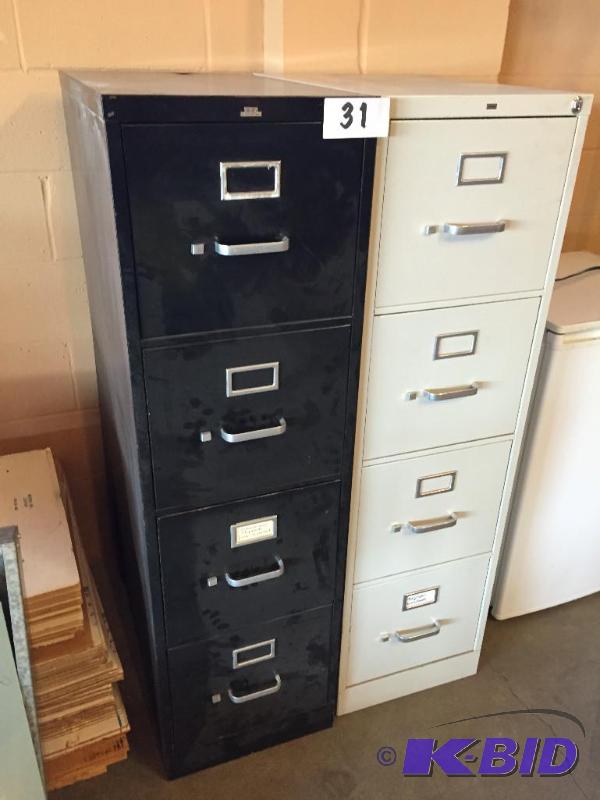 lot 31 image: Lot of 2 4-drawer metal filing cabinets....