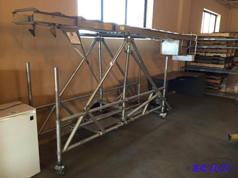 lot 33 image: Aluminum rolling tilting safety ladder....