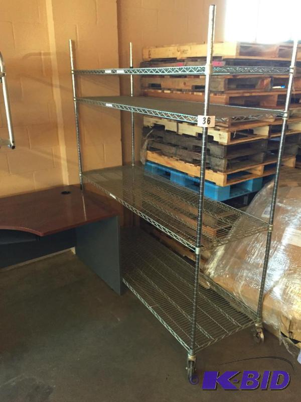 lot 36 image: Metro racking cart with 4 shelves....