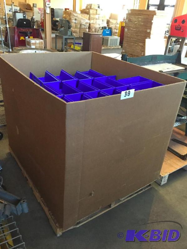 lot 39 image: Large gaylord box full of plastic stacking pa...