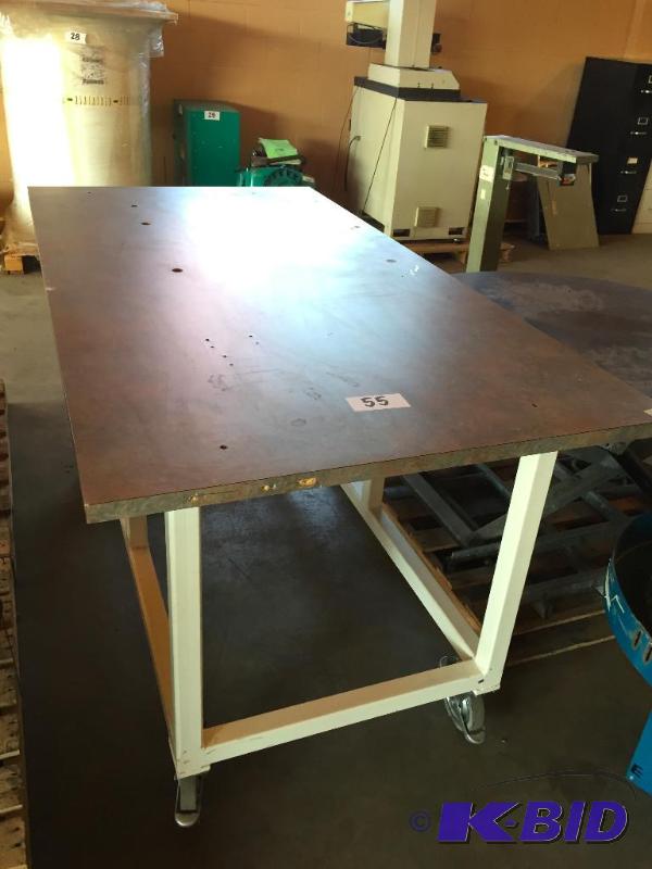 lot 55 image: Work table on wheels....