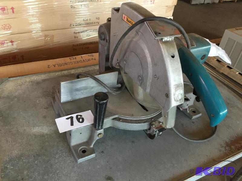 lot 76 image: Makita miter saw....