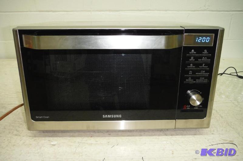 lot 14 image: Samsung MC11H6033CT Countertop Convection Microwave  Stainless Steel