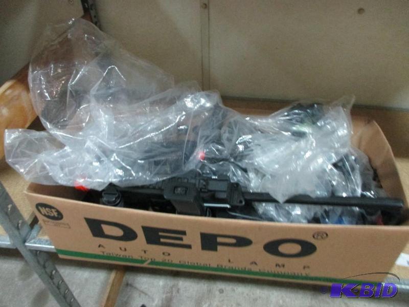 box of airsoft guns and parts...