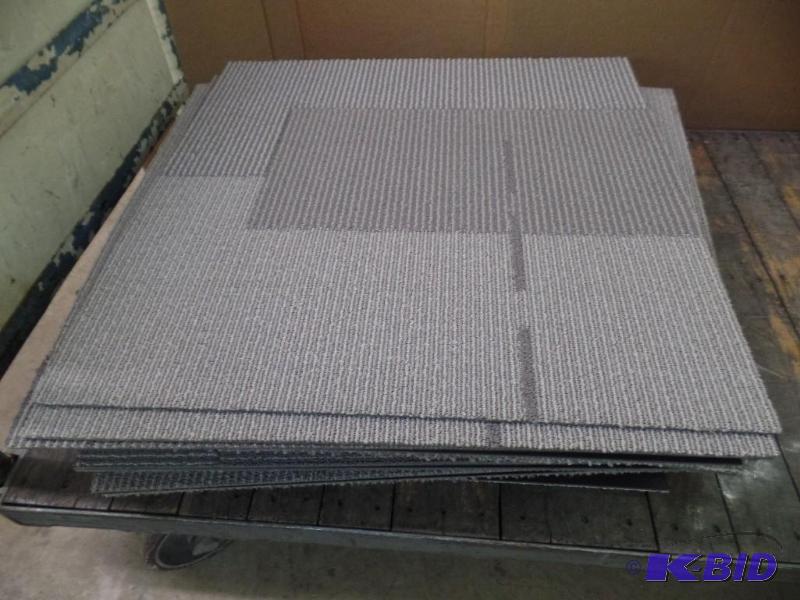 lot 41 image: 24 Gray Carpet Tiles
