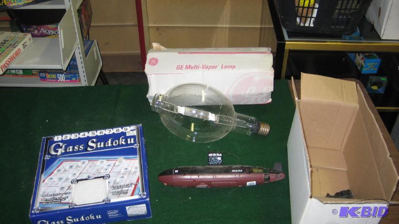 sudoko game, large light bulb, and model ship...
