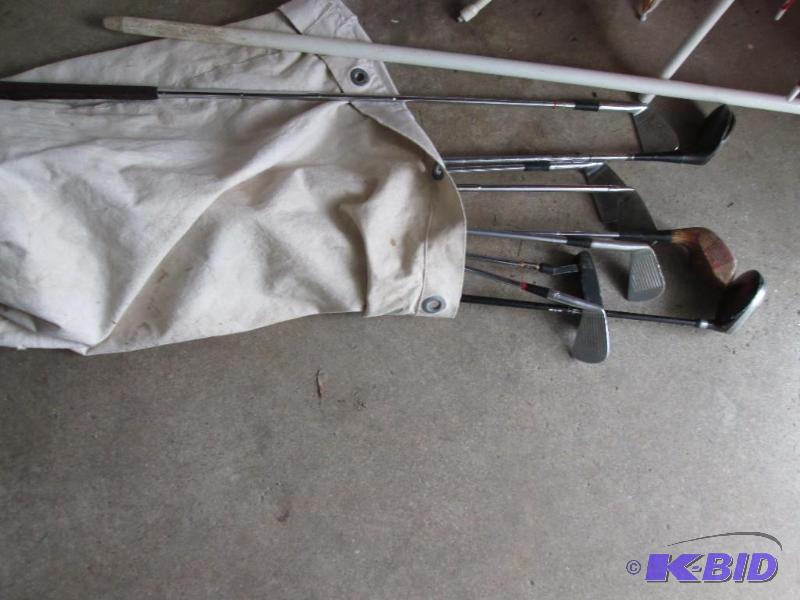 Golf clubs in a canvas bag...