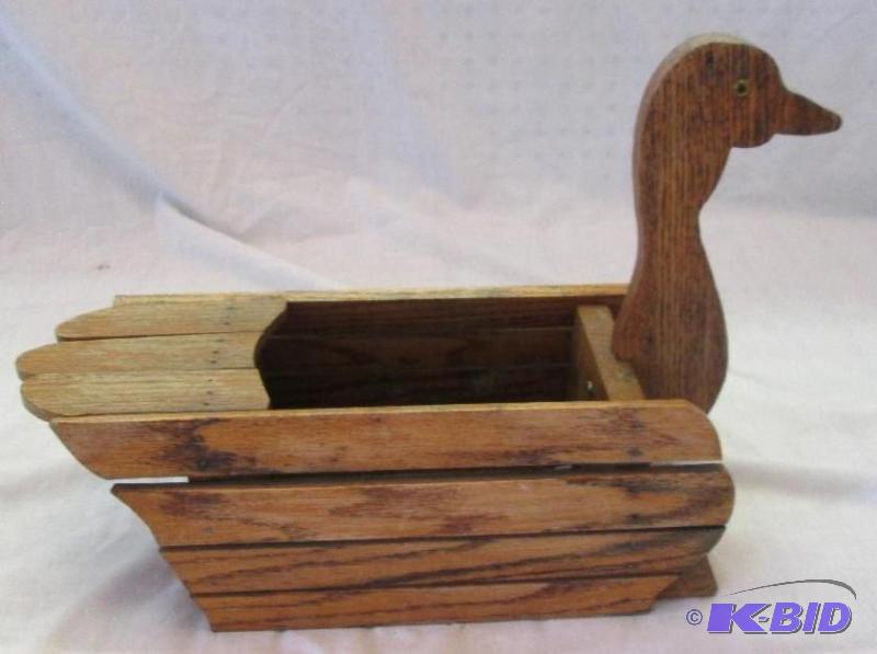wooded duck shaped basket...