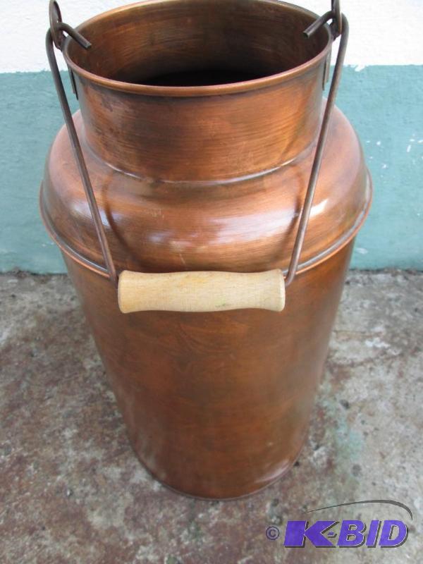 Clean copper looking tall jug with handle...