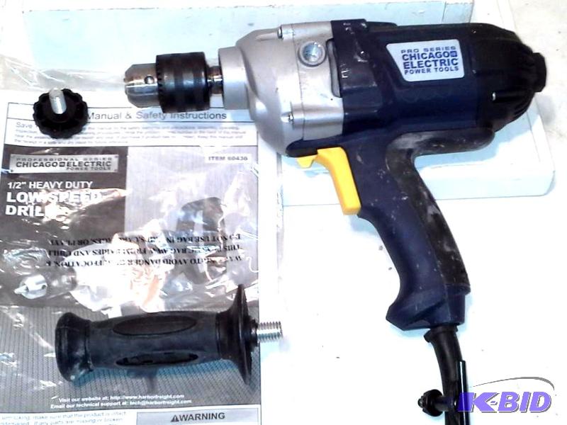lot 32 image: 12 in. Heavy Duty Low Speed Variable Speed Reversible Drill