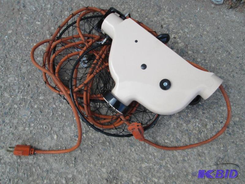 Brand new extension cord winder with used cor...