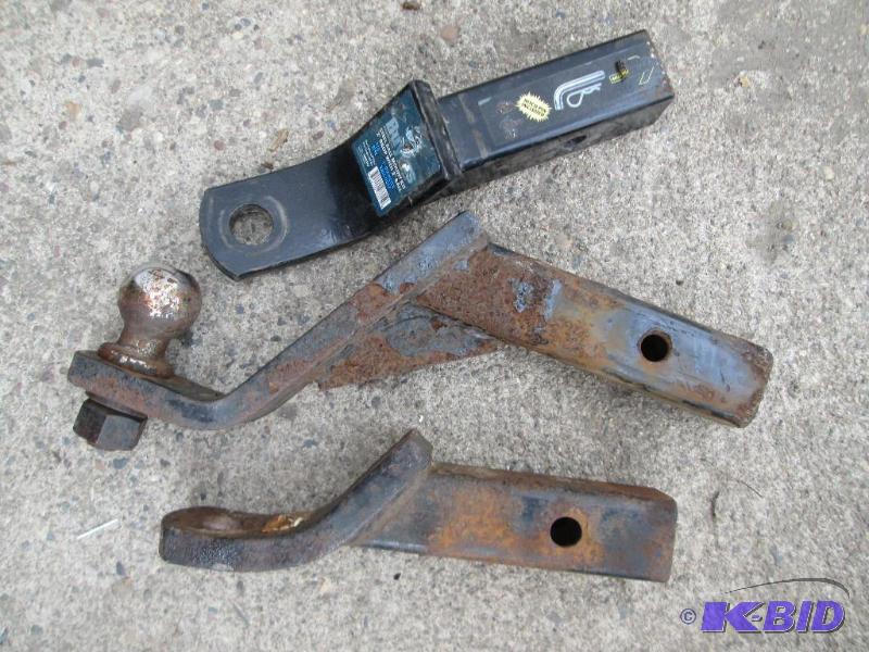 3 receiver hitches, one with a large drop, an...
