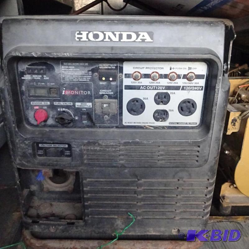 lot 16 image: Honda portable - inverter style generator...