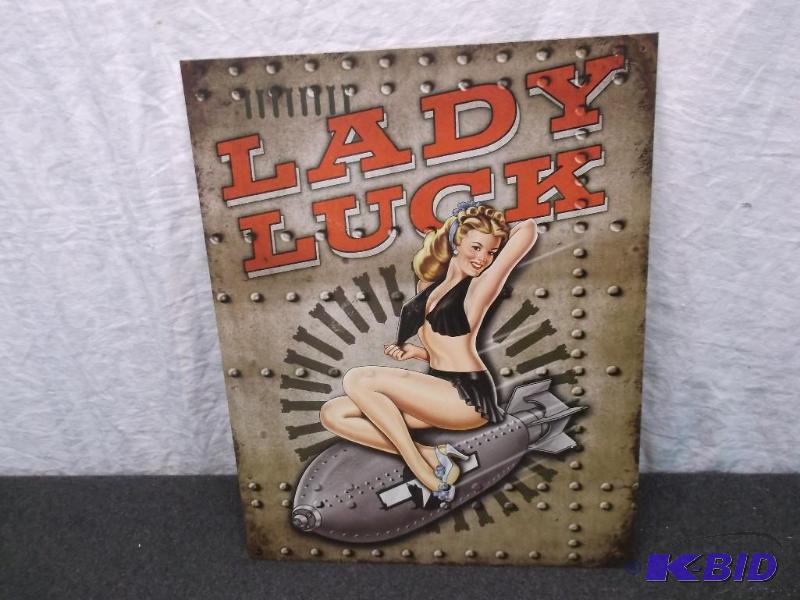 Collectable metal Lady Luck sign measuring 12...