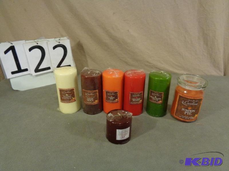 6 New Pillar Candles and Jar Candle. They sme...