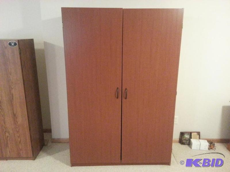 lot 67 image: Nice Large Storage Cabinet  71" tall x 4...