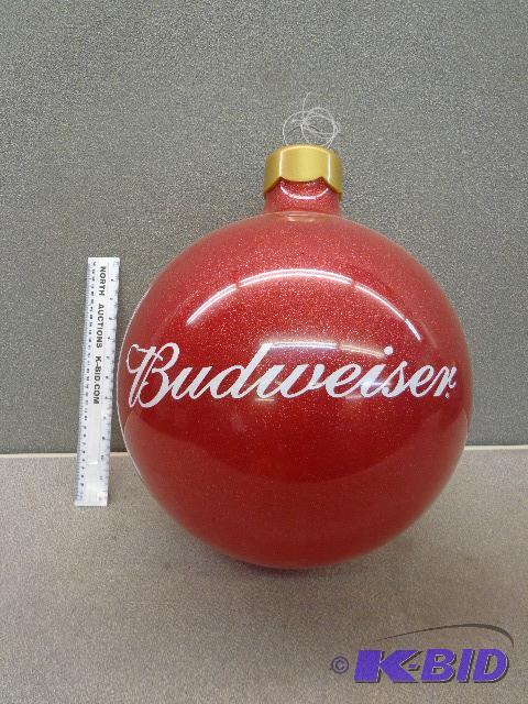 lot 103 image: Large Budweiser Ornament   44" around an...