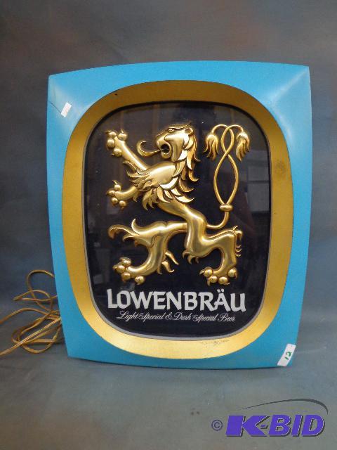 lot 12 image: Lowenbran&nbspLighted Sign   16 x 17 x 4  w...