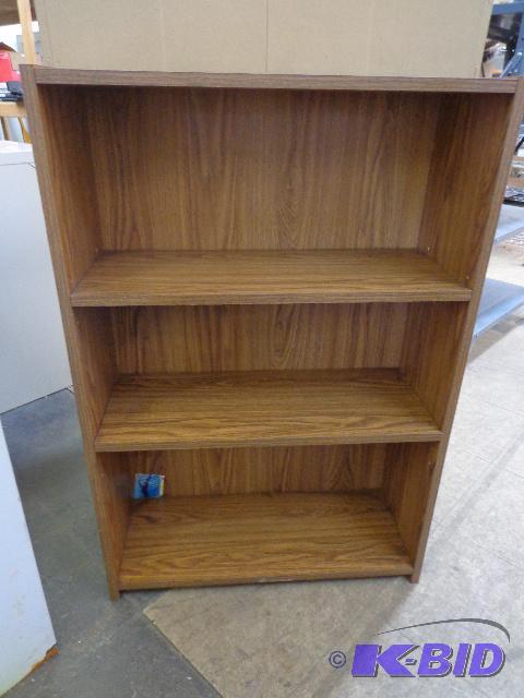 lot 26 image: Bookshelf   3 shelves  24 x 36 x 10  particle...