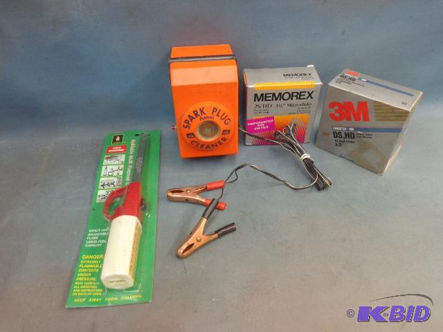 lot 60 image: Box of Assorted Items   Lighter  Spark Plug C...