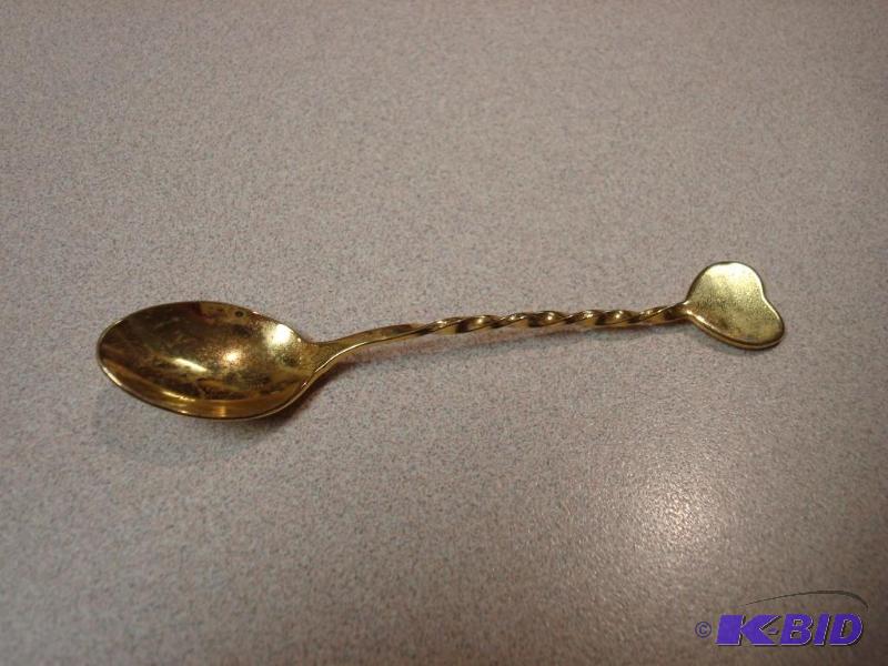 Small Steel Gold Tone Spoon...