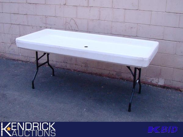 lot 110 image: Fill-n-Chill Beverage Table