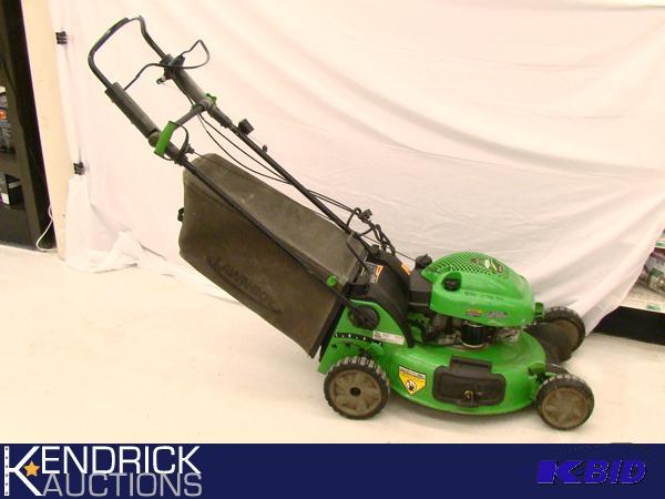 lot 15 image: 21 4 Cycle Lawnboy Lawn Mower